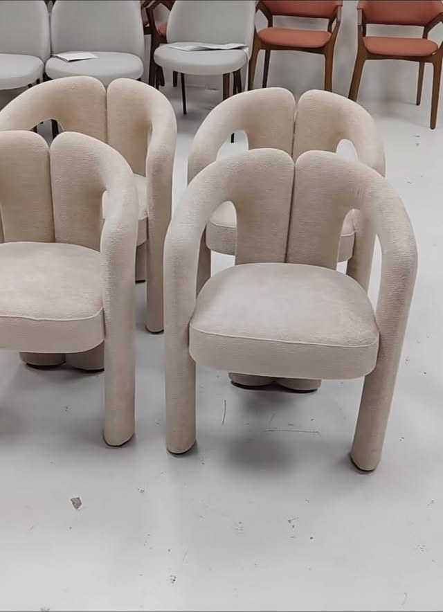 Cream Sculptural Armchairs